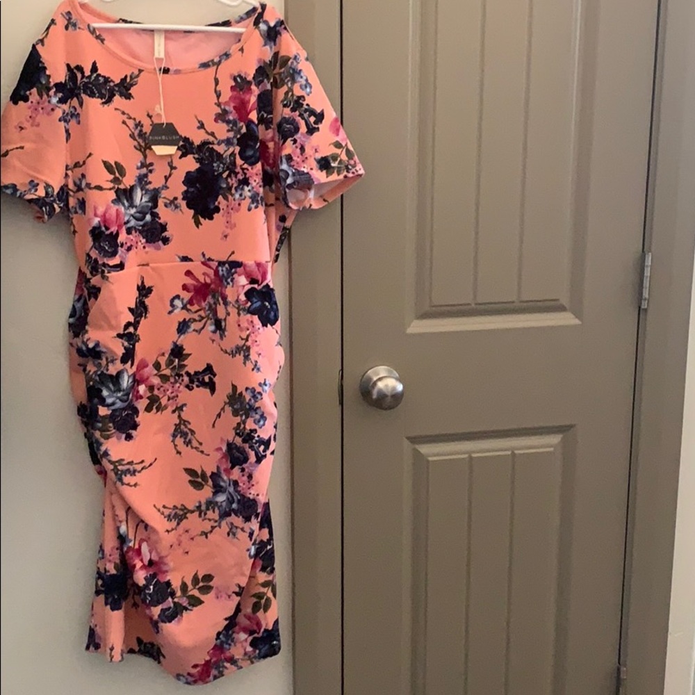 Flowered pink maternity dress.